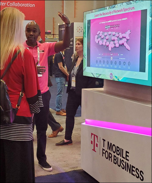 T-Mobile for Business network spectrum touchscreen demo at trade show
